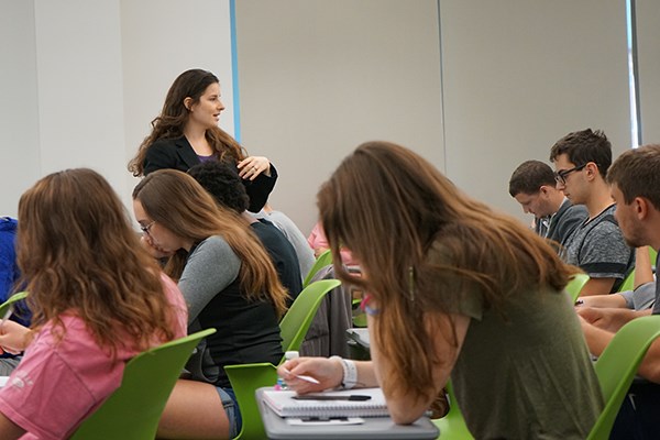 Asst. Prof. of Psychology Yana Weinstein gives students questions to write about and discuss in class.
