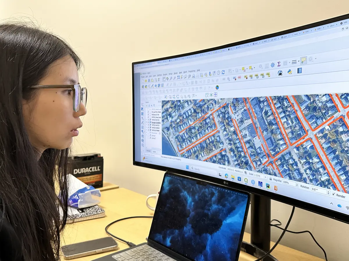 Postdoc Xintong Yan works on an AI identification tool for mapping sidewalks