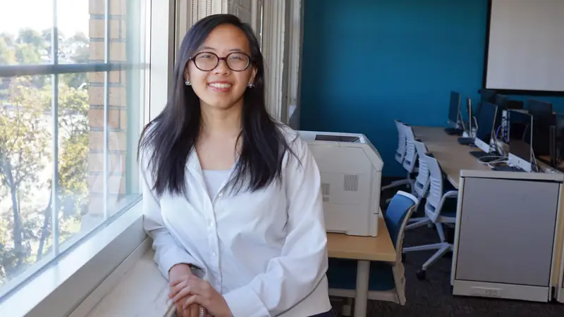 Xonyia Vang in a UMass Lowell computer science classroom.