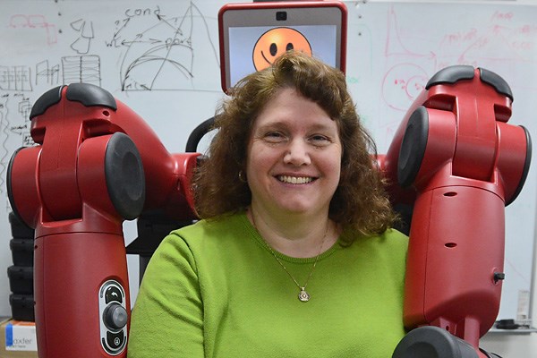 Prof. Holly Yanco with a Baxter robot