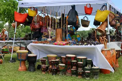 Colorful African baskets and woven purses in tent