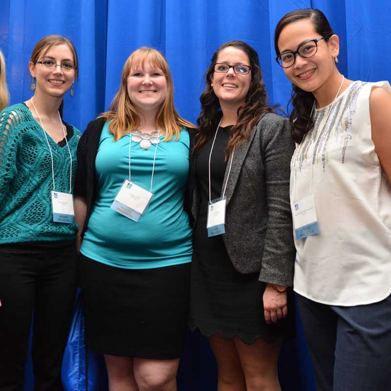 Students pose together at the UMass Lowell Student Research Symposium.