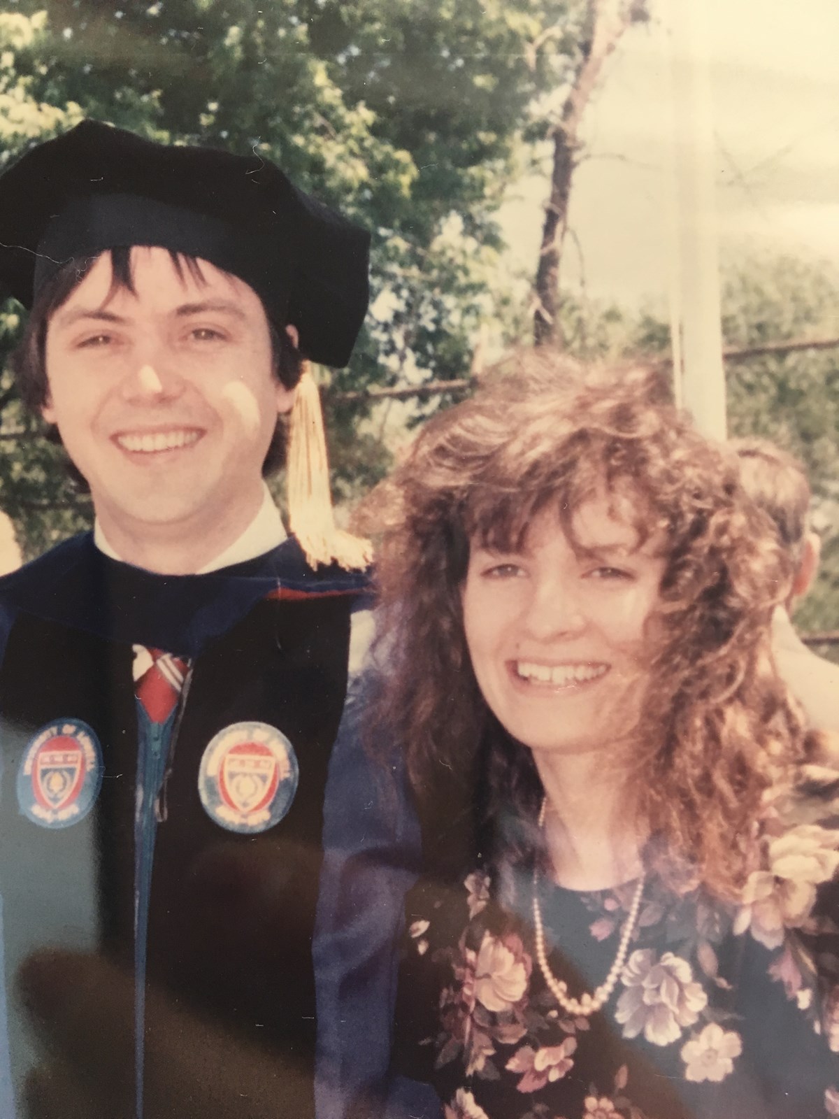 A photo of alumni Jim and Valerie Giovino-Barry at graduation in 1988