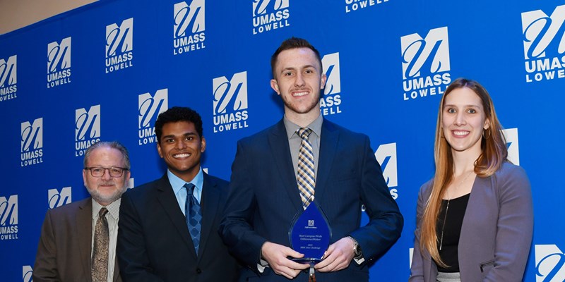 From left to right: Steve Tello, Edward Morante, Benjamin Mcevoy (holding the Rist Campus Wide DifferenceMaker award) and Holly Butler