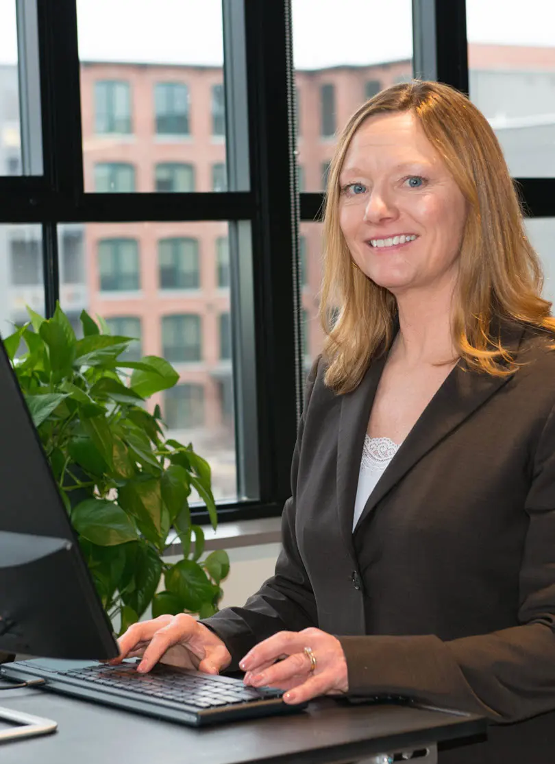 Beth Loring at her desk in the iHub