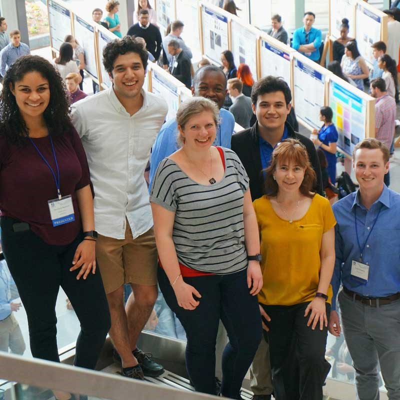 Group of students pose at a biotechnology conference