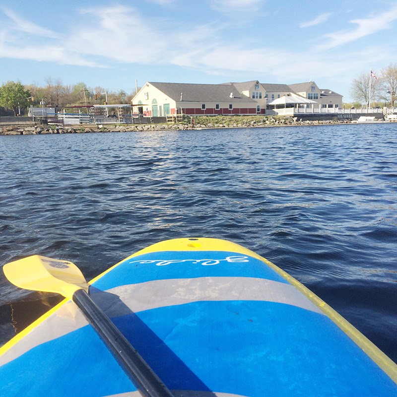 UMass Lowell boathouse from river