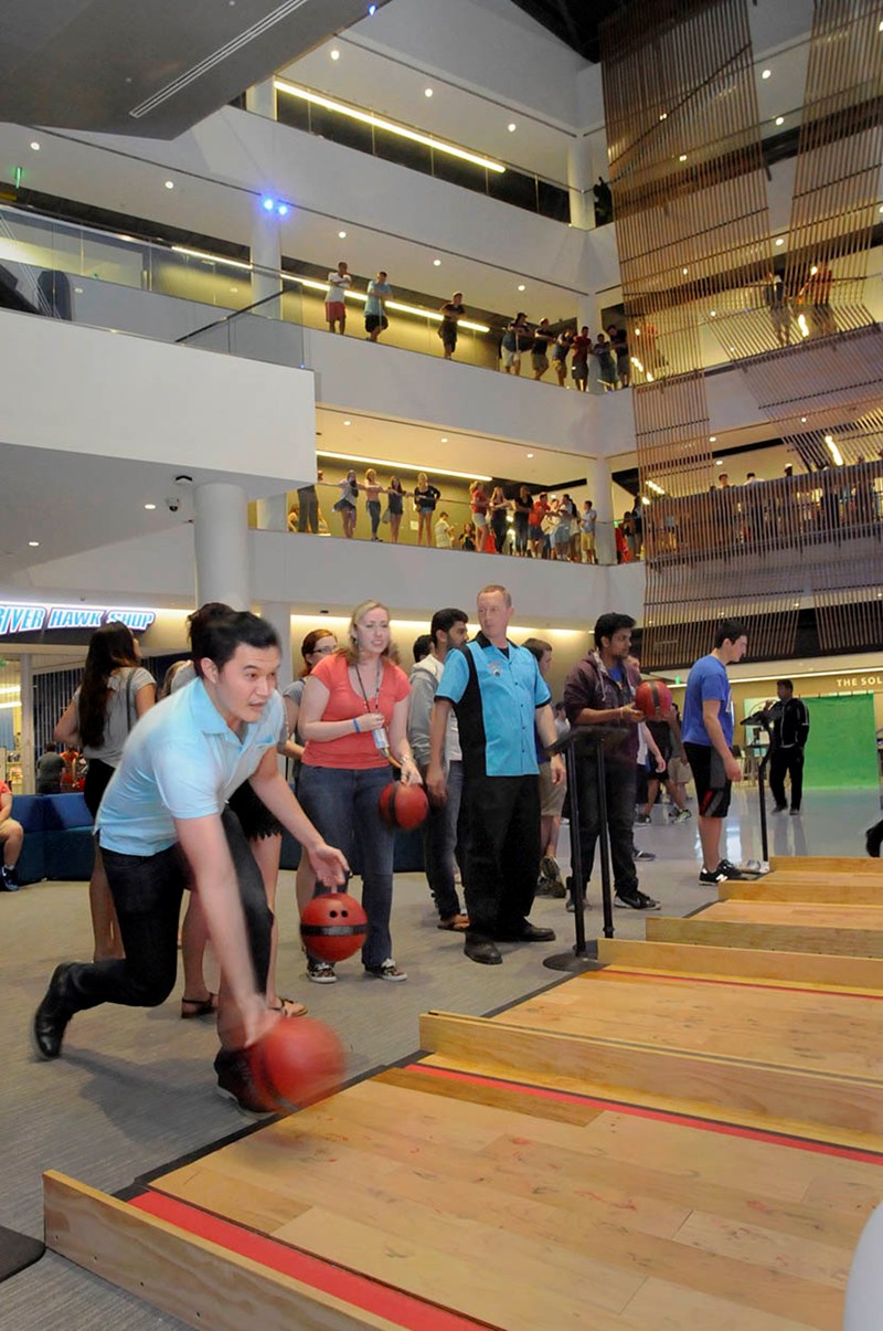 UML students bowl inside University Crossing at the annual After Dark event
