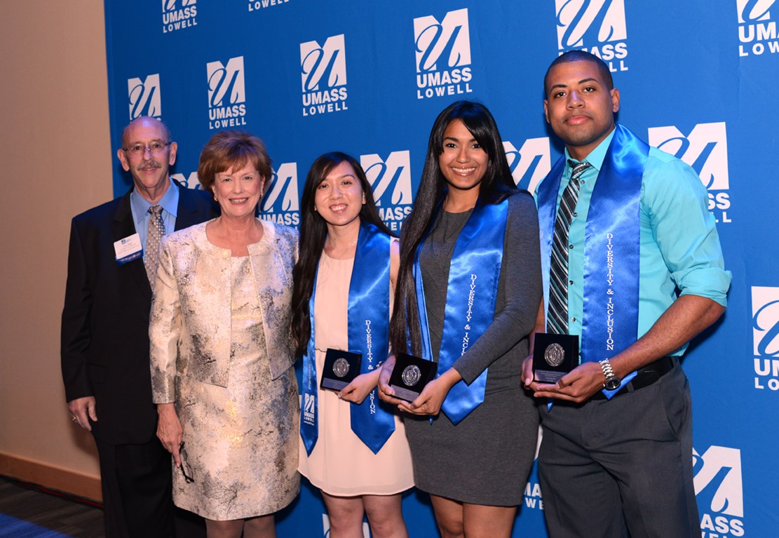 Larry Siegel, Associate Vice Chancellor for Student Affairs and University Events, and Chancellor Jacquie Moloney with three honored student award winners at the 2017 Commencement Eve Celebration