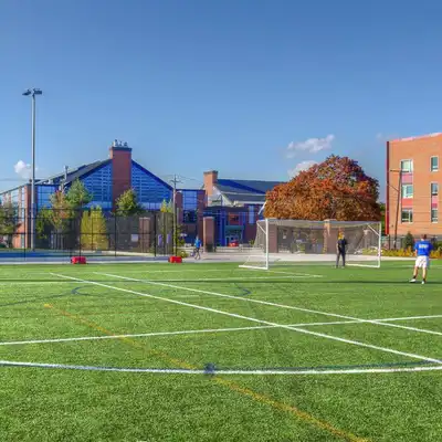 Students play on the UMass Lowell Campus Recreation Complex fields.