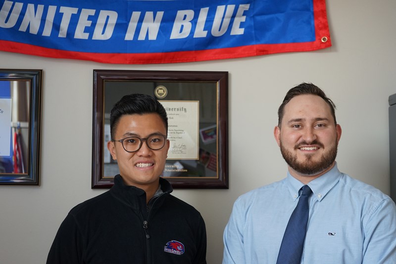 Daniel Barros (right) who helped start a unified basketball league with John Luk (left), coordinator of intramural sports and youth programs at the Campus Recreation Center