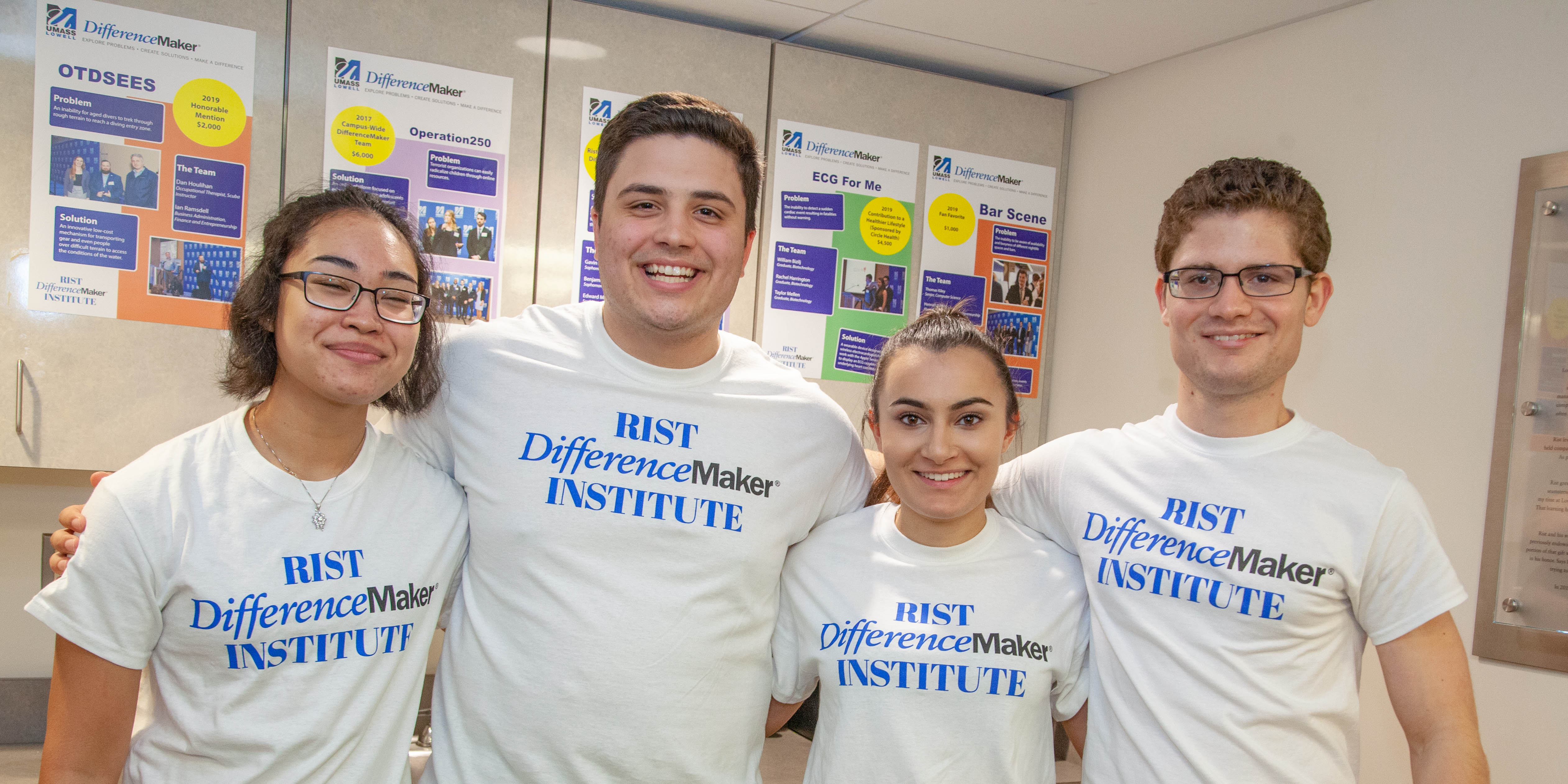 Group of four students wearing RIST DifferenceMaker Institute T-shirts