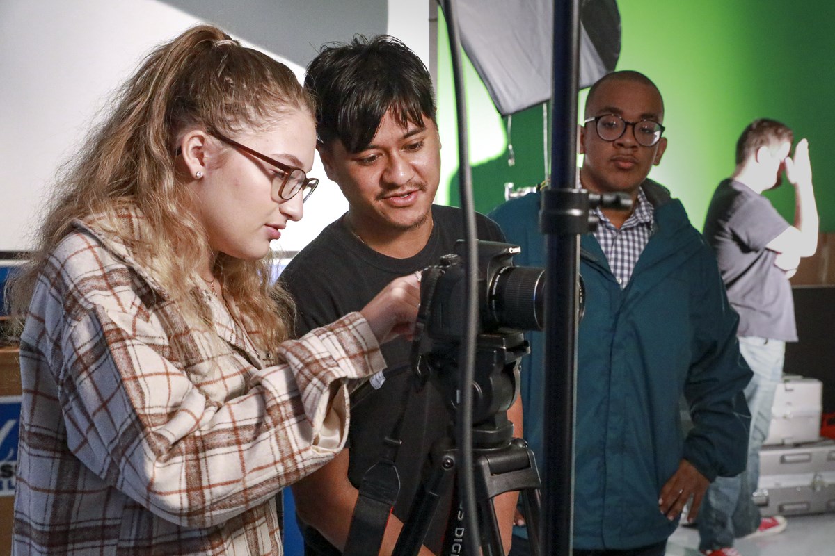 Digital Media students operating a camera in a UMass Lowell studio