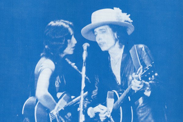 Joan Baez (left) and Bob Dylan serenade the crowd at Costello Gymnasium on Nov. 2, 1975