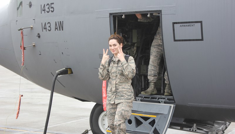 Air Force ROTC student Elinor Mayo leaving a plane in uniform