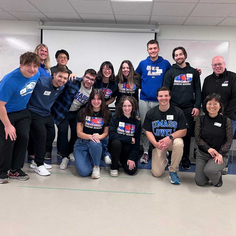 A group of UMass Lowell exercise science students pose with their professors.