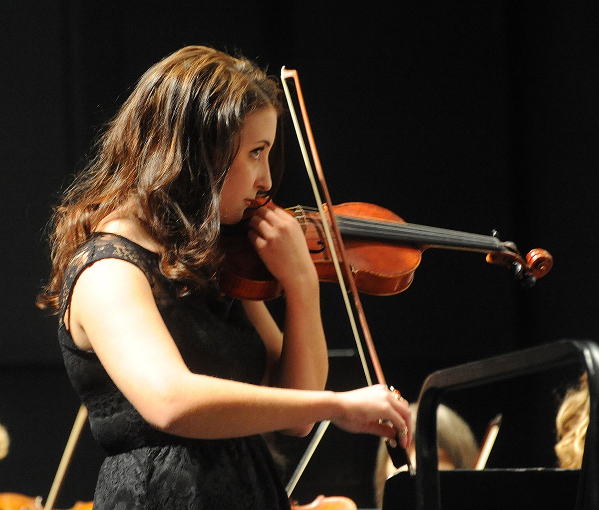 A violinist performs at the University Orchestra's "All You Need is Love!” Valentine's Day concert.