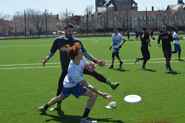 UMass Lowell students play ultimate frisbee on the new Campus Rec Complex on East Campus