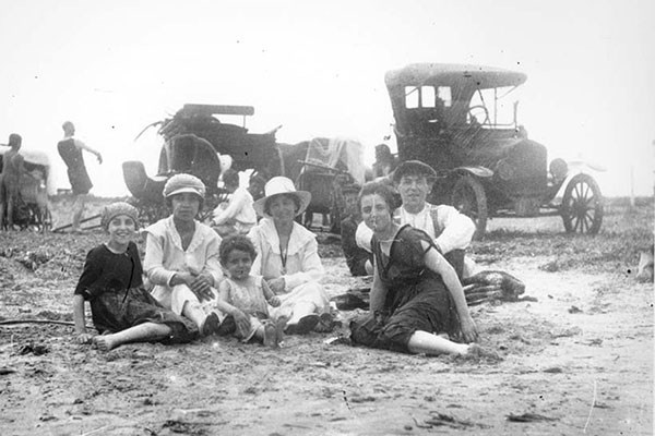A Portuguese-American family enjoys a day at the beach at a Lowell area lake in the early 1900s.