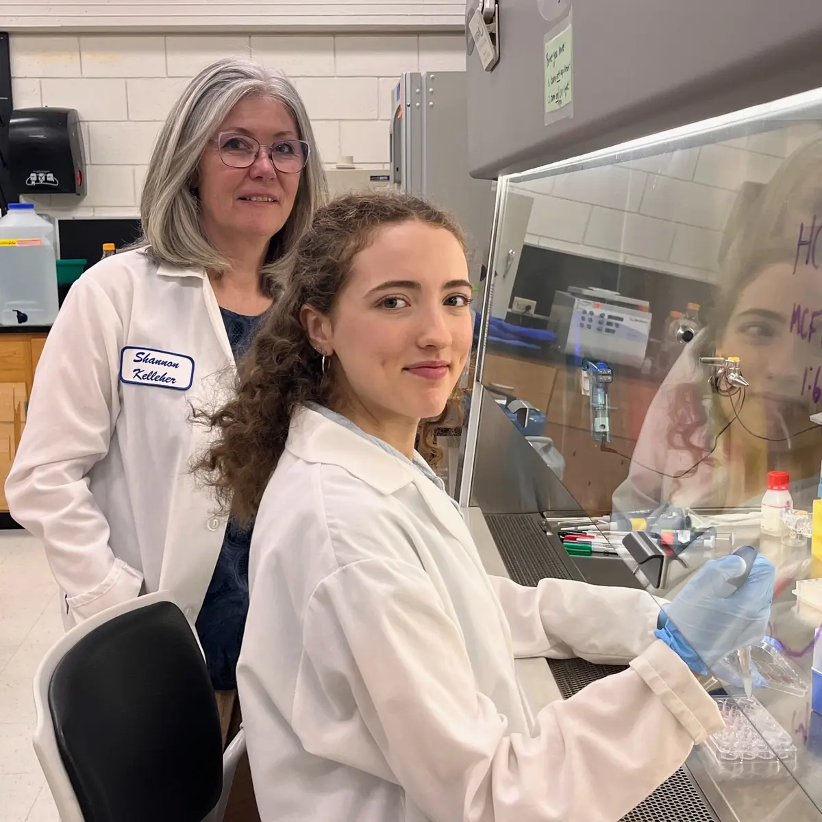 Professor and student in a UMass Lowell research lab.