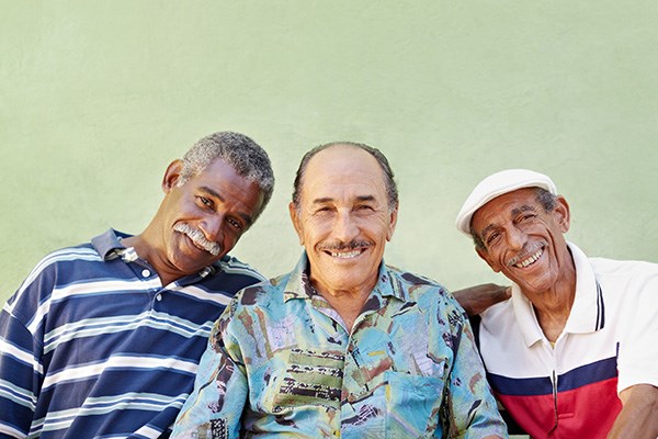 Three Puerto Rican men smiling