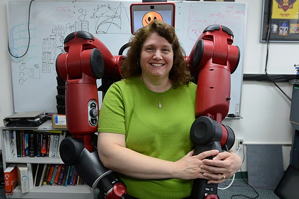 Prof. Holly Yanco with a Baxter robot