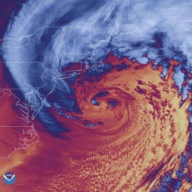 Color satellite image of hurricane swirling off coast of New England