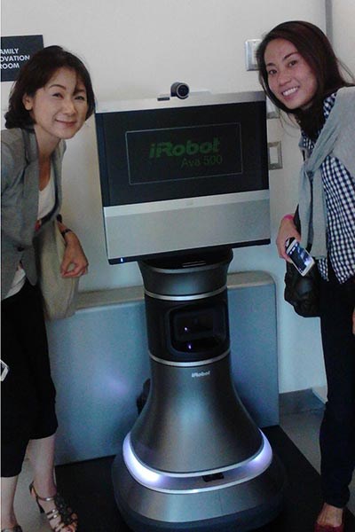 Students from UMass Lowell's Global Entrepreneurship Program tour iRobot.