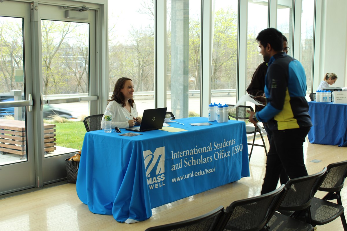 ISSO staff providing assistance to the arriving international students.