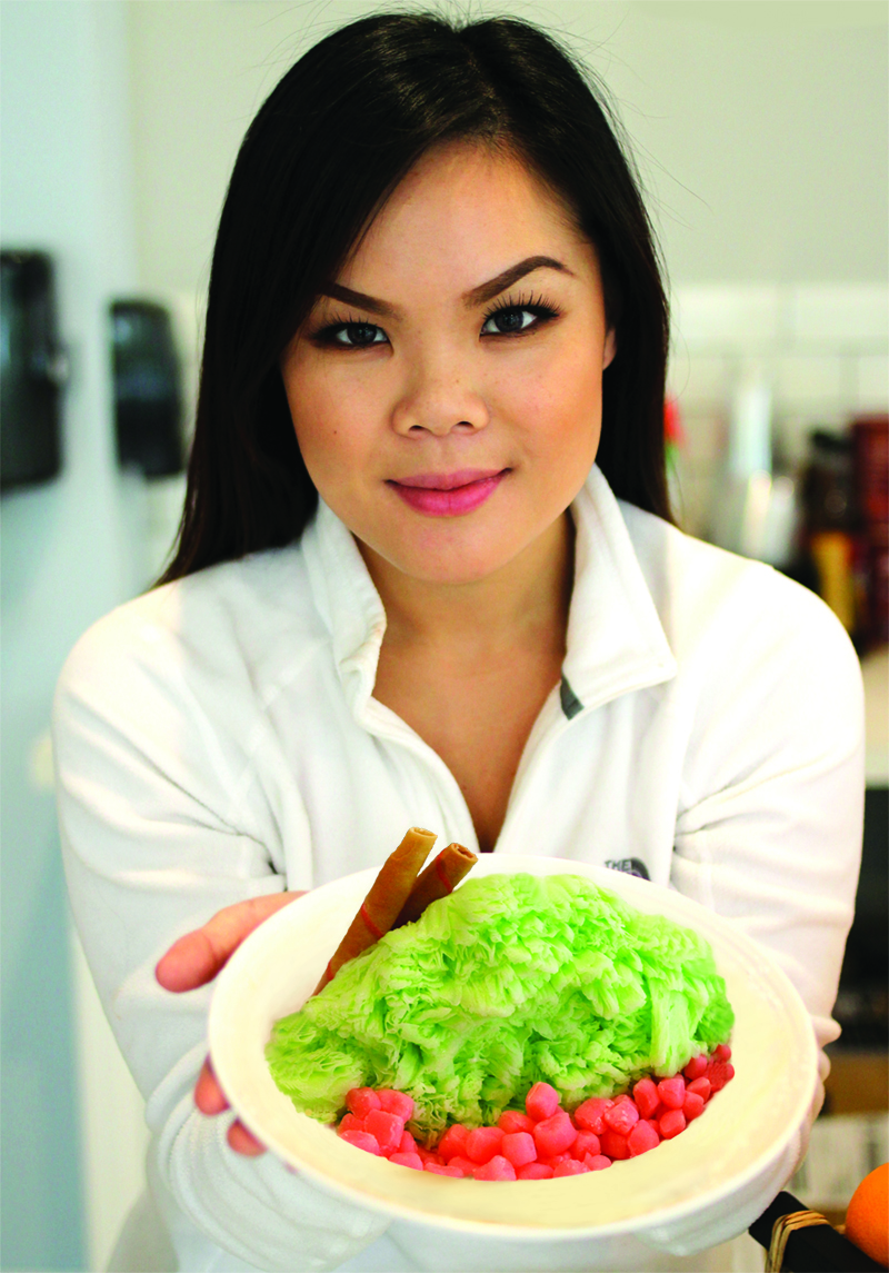 Jennifer Heng holds a colorful bowl of shaved snow