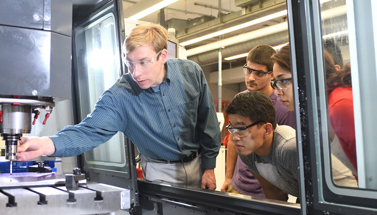 Steve Johnston in lab with students