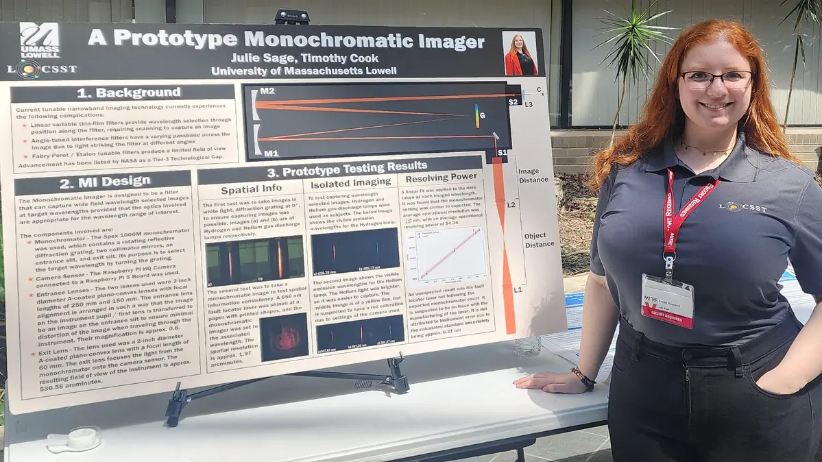 Julie Sage stands with her and Timothy Cook's poster "A Prototype Monochramatic Imagers."