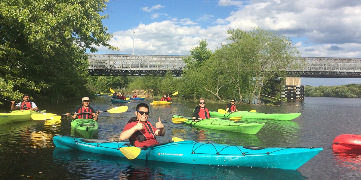 Enthusiastic Kayaker Gives Two Thumbs Up. At the UMass Lowell Kayak Center you can rent kayaks, canoes, stand-up paddle boards or sign up for kayaking instructional programs, tours and events! 