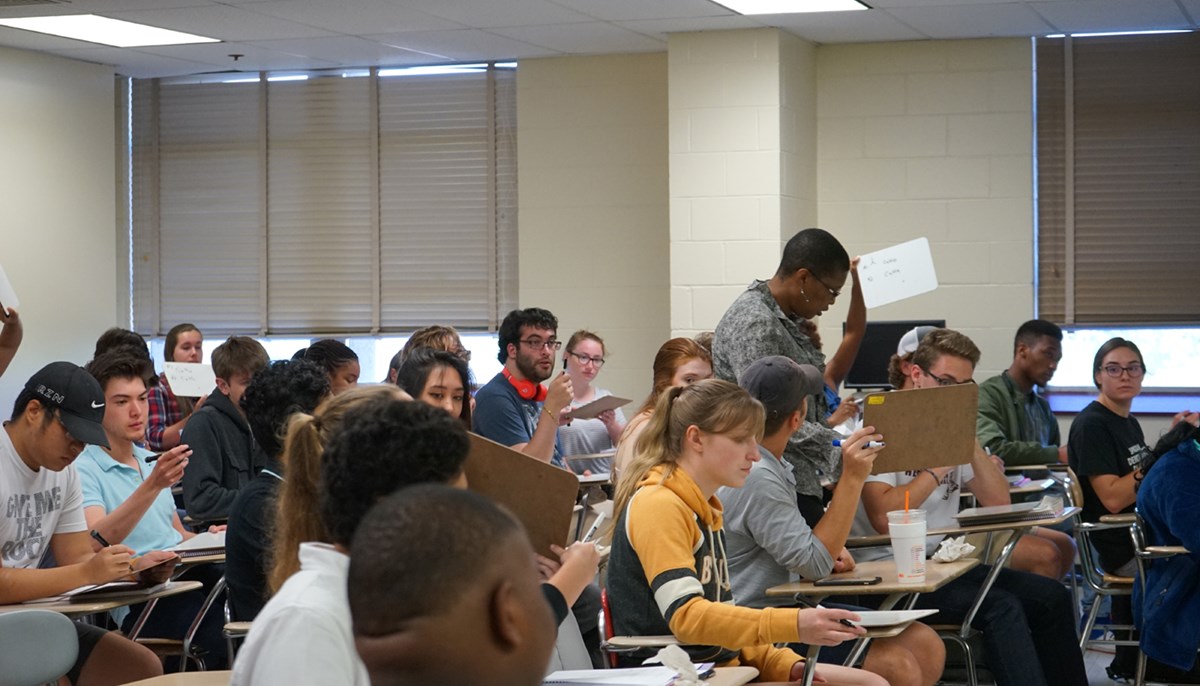 UMass Lowell organic chemistry professor Khalilah Reddie in a classroom full of her students