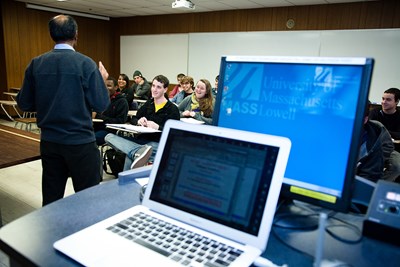 laptop-foreground-teacher-class-background
