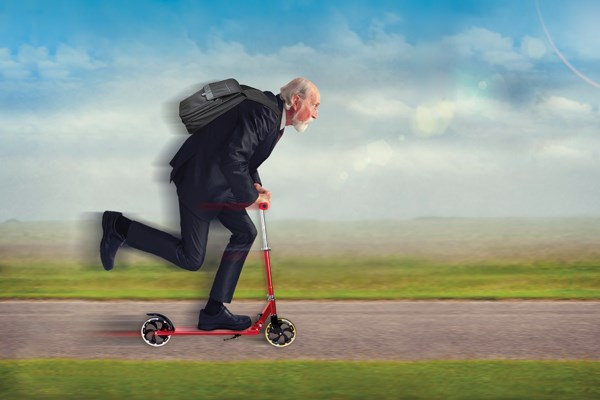 Illustration of a white-haired nonagenarian in a suit zooming on a red scooter