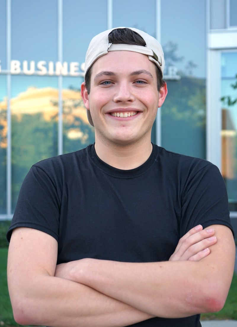 headshot of Matt Murphy outside in front of the Pulichino Tong Business Center at UML