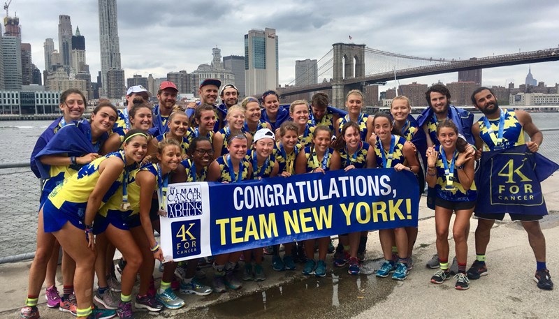 Meghan Berking and her team, Team New York, at the finish line for the Ulman Cancer Fund for Young Adults 4K, a run from San Francisco to New York City
