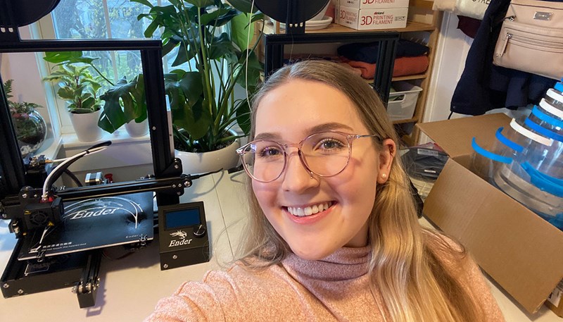 Molly Tecce in her office with 3D Printer