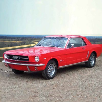 Photo of a 1965 red Ford Mustang