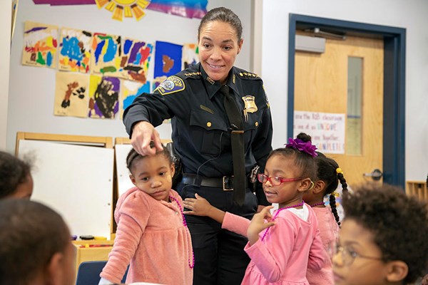 Boston Police Superintendent and UML alum Nora Baston works with kids