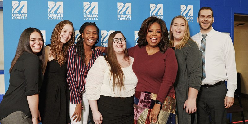 Oprah Winfrey with student scholarship winners