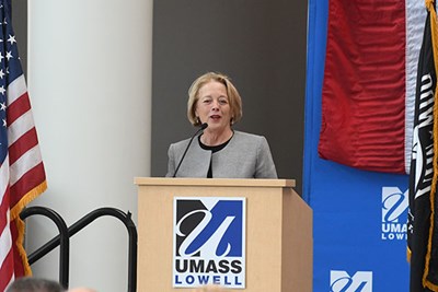 U.S. Rep. Niki Tsongas speaks at podium at UMass Lowell