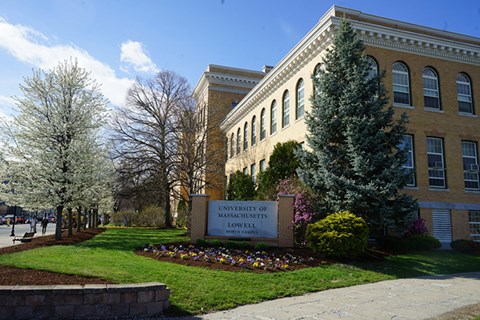 The UMass Lowell sign outside Southwick Hall on North Campus in the spring