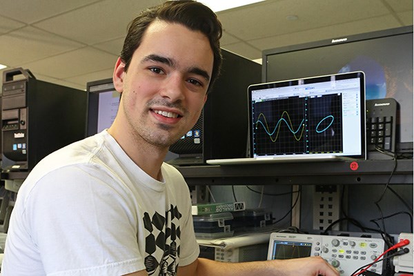Electrical Engineering student Michael Nuzzo in lab