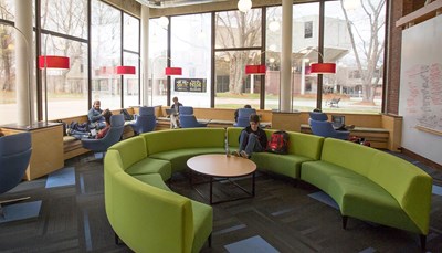 Students hanging out in O'Leary Library's lounge space. 