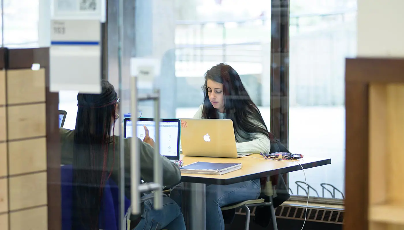Student works on laptop at UMass Lowell
