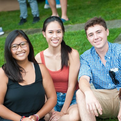 3 students smiling