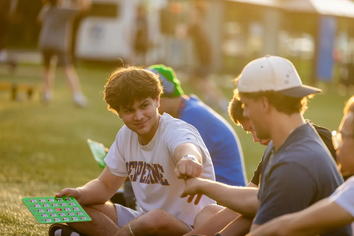 Students play outdoor bingo at the Engagement Fair.