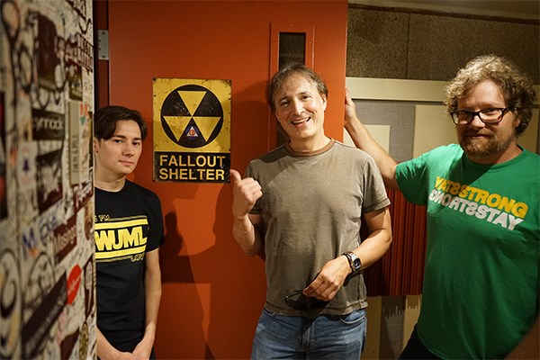 From left, current WUML station maganer Chris Romano, "Live from the Fallout Shelter" co-founder Chris Porter and veteran station Operations Manager Tom Tiger in the Fallout Shelter studio, where live music broadcasts have survived since April 1, 1985.